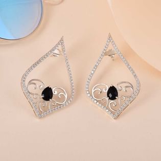 Regal Silver Earrings With Heritage Charm