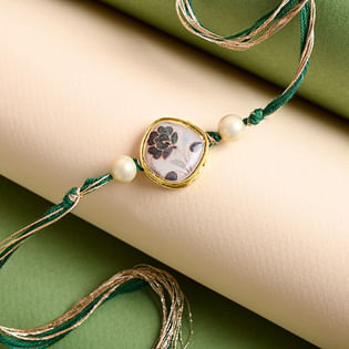 Online Rakhi in India - Resham Flower Charm Rakhi