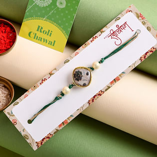Online Rakhi in India - Resham Flower Charm Rakhi
