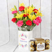 Rocher Anniversary Flowers Combo - Bunch of 10 Red and Pink Carnations with 2 Yellow Lilies and Anniversary Flower Box and Pack of 16 Ferrero Rochers