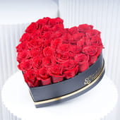 Romantic Embrace In Red Roses