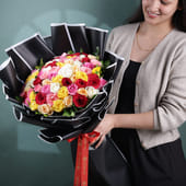 Roses In A Colourful Embrace