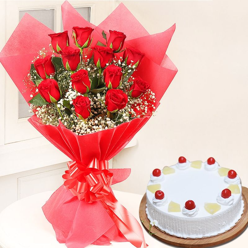 Rosey Cakey Combo - Bunch of 12 Red Roses with 500gm Pineapple Cake