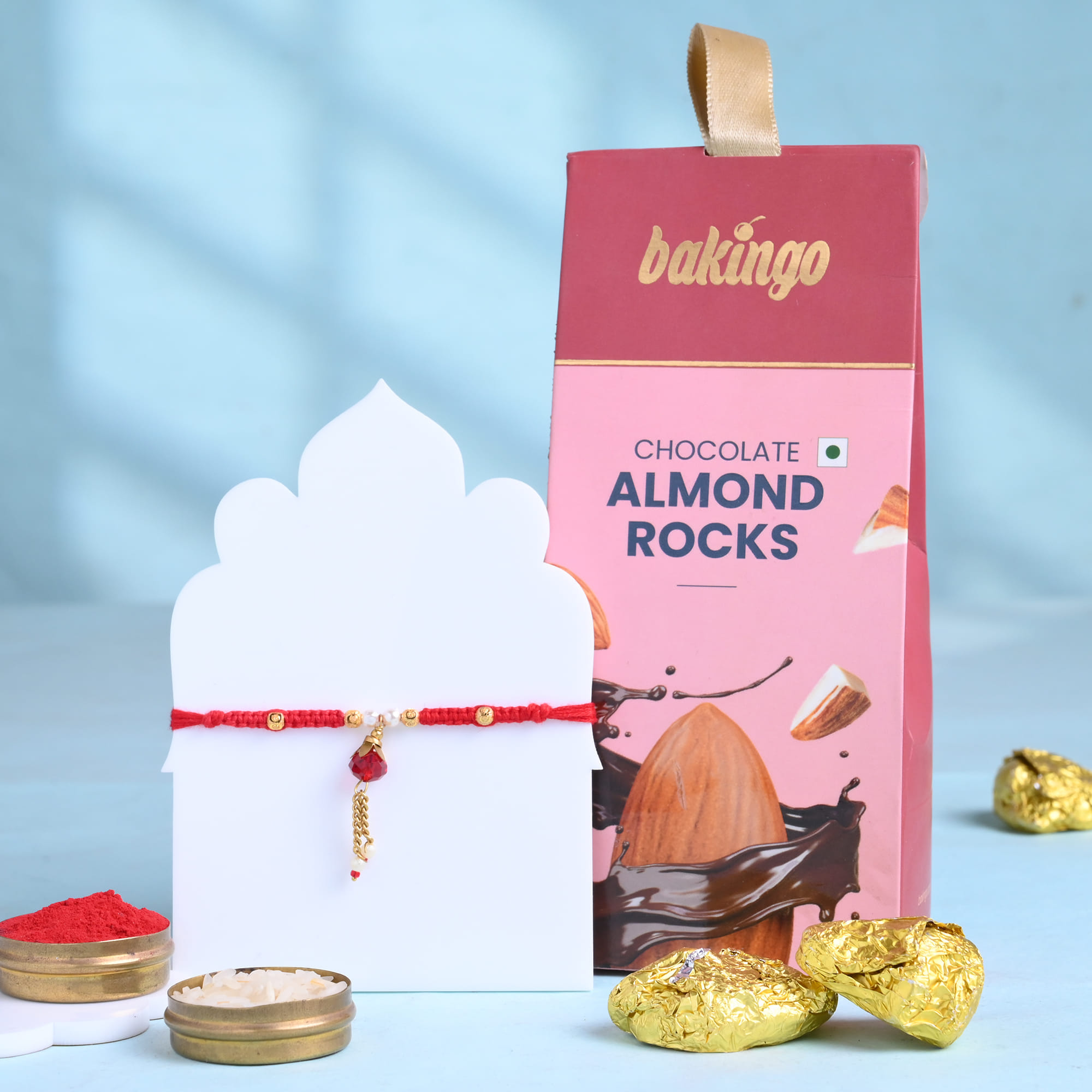 Ruby Drop Charm Rakhi With Choco Almond Rocks