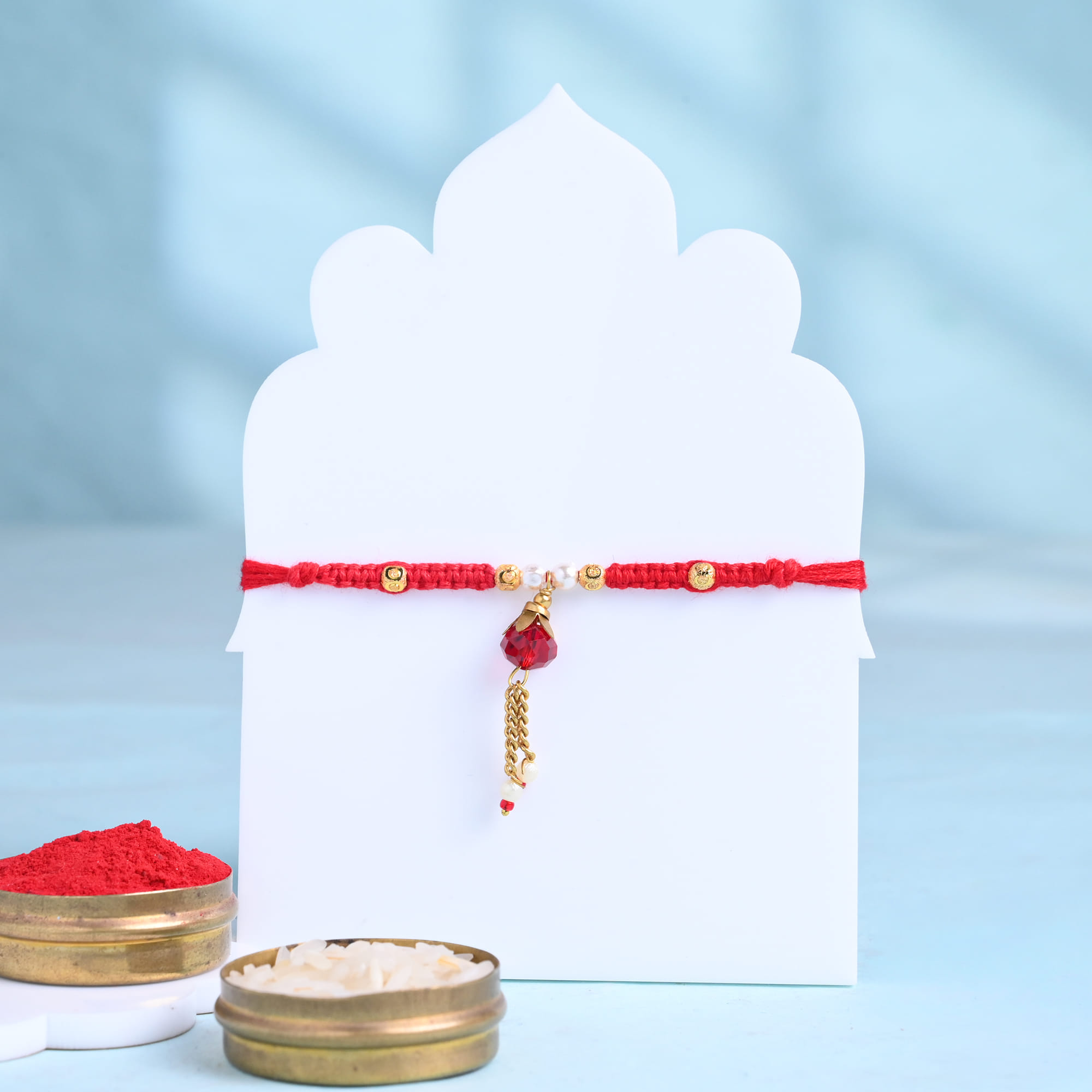Ruby Drop Charm Rakhi With Choco Almond Rocks