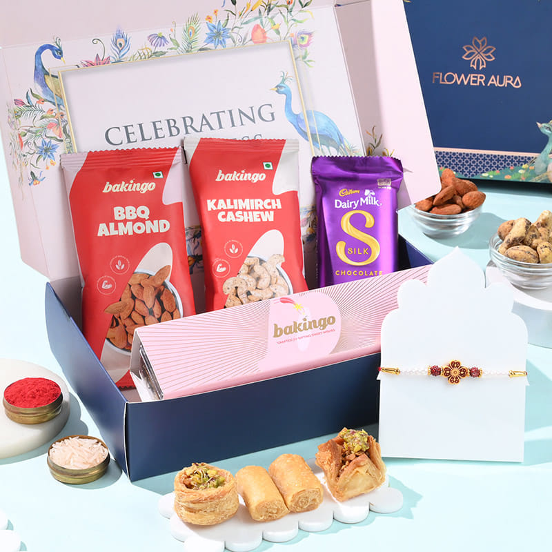 Ruby Floral Rakhi N Gourmet Indulgence Hamper