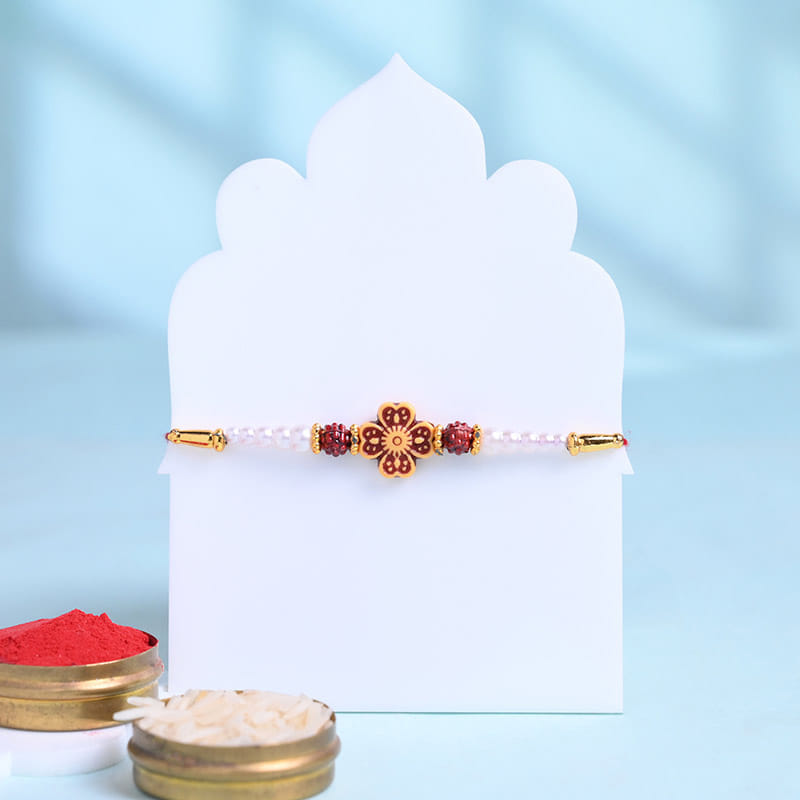 Ruby Floral Rakhi N Gourmet Indulgence Hamper