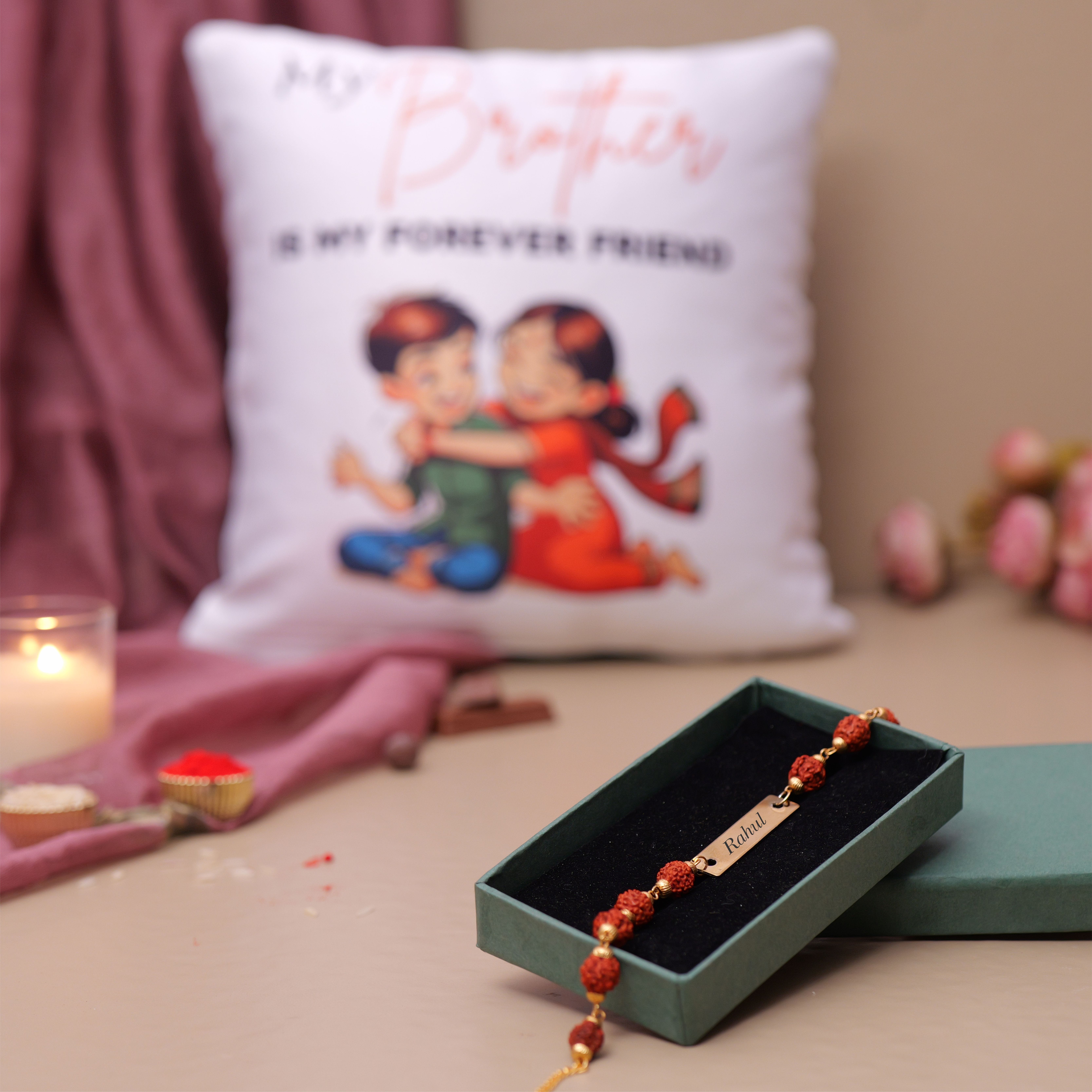 Rudraksha Metal Rakhi With Love In Fights Pillow