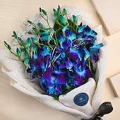 Rudraksha Mor Pankh Couple Rakhi N Blue Orchid Bouquet