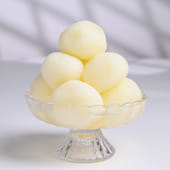 Sacred Rakhi Pair with Traditional Rasgullas
