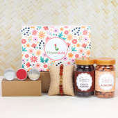 Rudraksha Signature Box - One Rudraksh Rakhi with Complimentary Roli and Chawal and 100gm Almonds in Plastic Container and 100gm Choco Almonds in Plastic Container and One Floweraura Signature Box