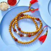 Rudraksha With Pearls N Om Beads Bracelet Like Rakhi