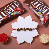 Send Rudrakshas Ganesha Rakhi online With Chocolates