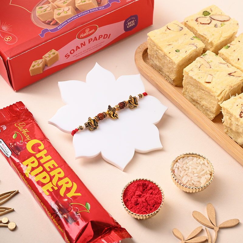 Ruraksha Ganesha Rakhi With Soan Papdi N Chocolate