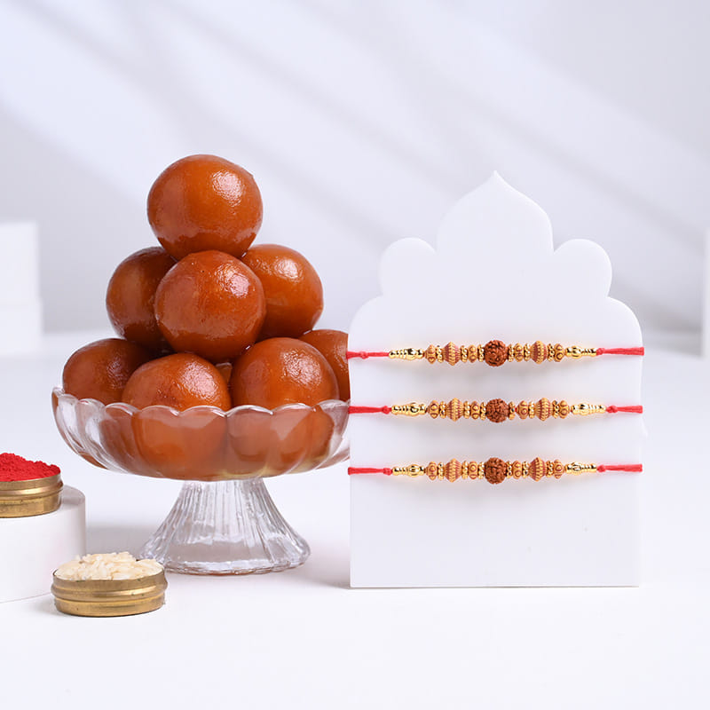 Sacred Bead Rudraksha Rakhi Trio With Gulab Jamun