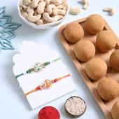Sacred Ganesha Rakhi Duo With Ladoos N Nuts