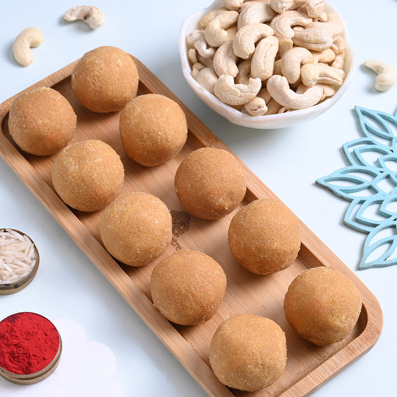 Sacred Ganesha Rakhi Duo With Ladoos N Nuts