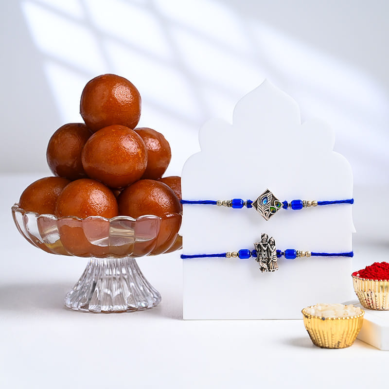Sacred Krishna N Peacock Rakhis With Gulab Jamun