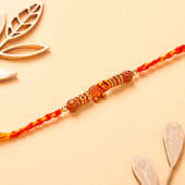 Vibrant Red And Yellow Mauli Thread Rakhi