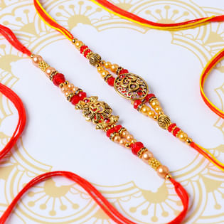 Sacred Om N Swastik Peark Rakhi Set