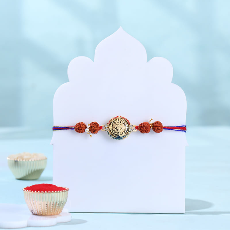 Sacred Om N Trident Rakhi With Choco Treats