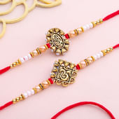 Sacred Om Pearl Rakhi Duo