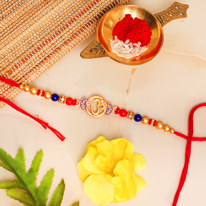 Sacred Om Rakhi - One Divine Rakhi with Complimentary Roli Chawal