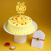Sacred Om Rakhi With Rasmalai Cake