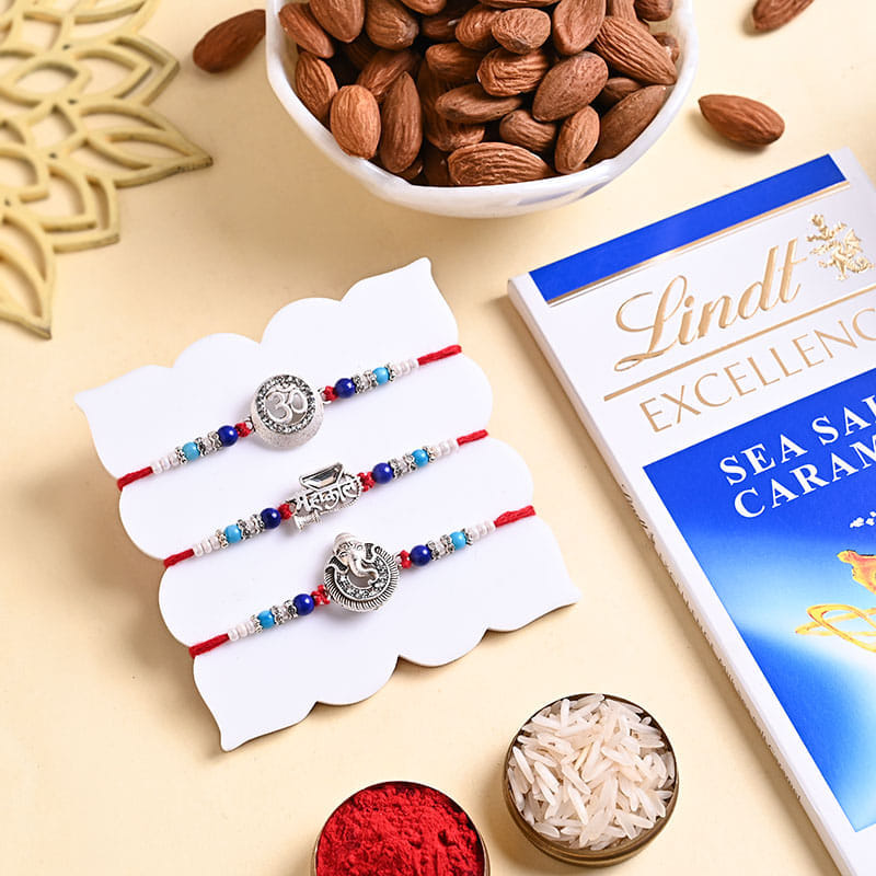 Sacred Rakhi Trio With Almonds N Chocolate