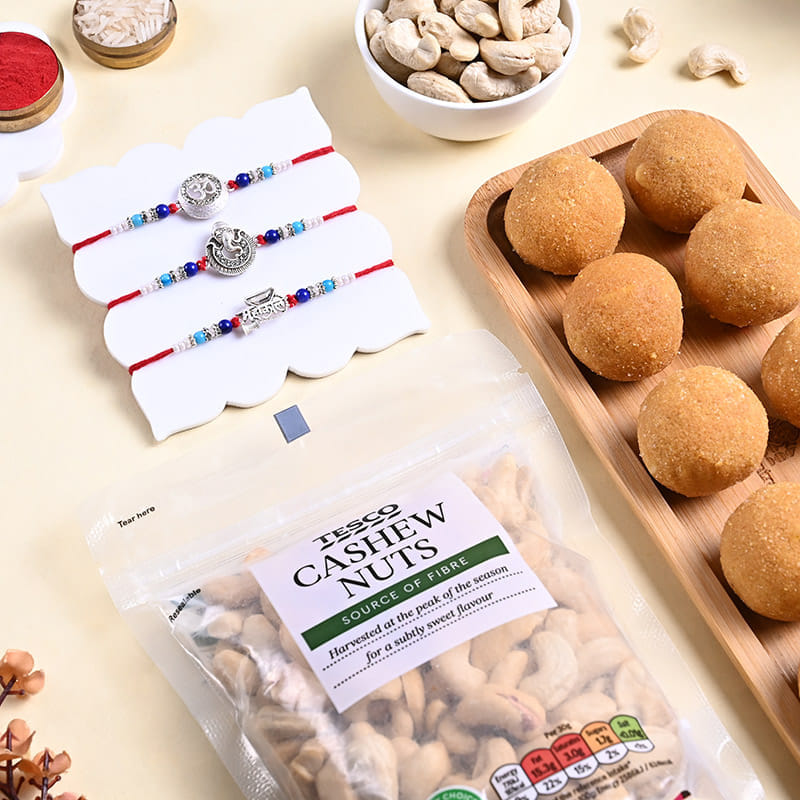 Sacred Rakhi Trio With Cashews N Besan Ladoos