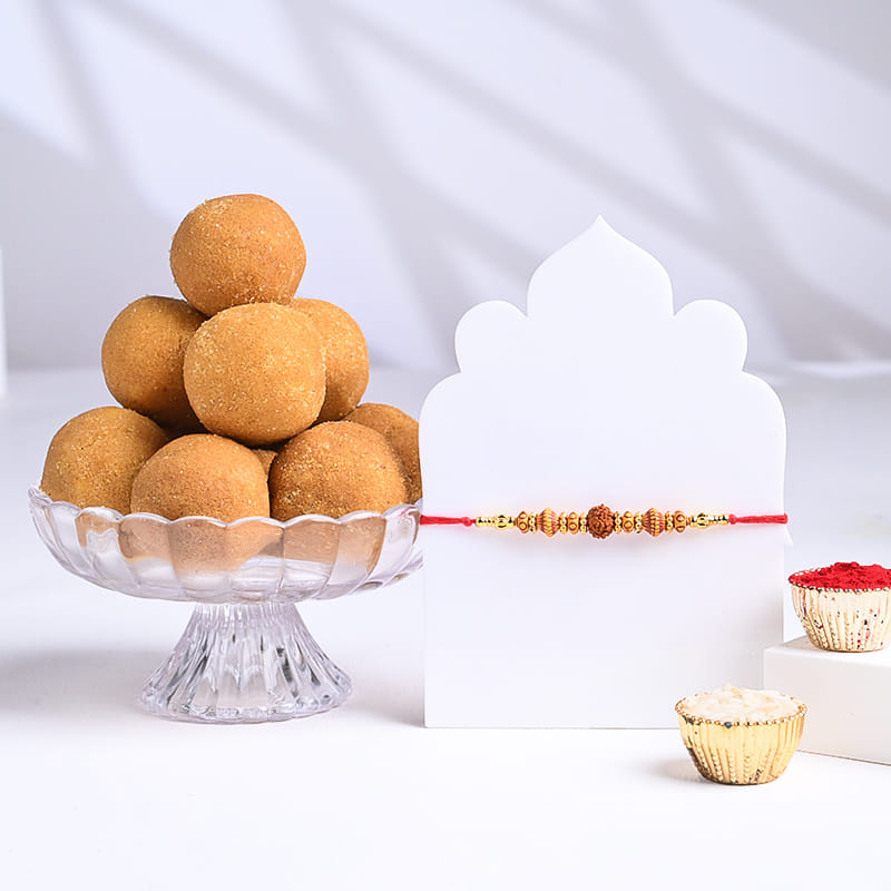 Sacred Rudraksha Rakhi with Besan Ladoo