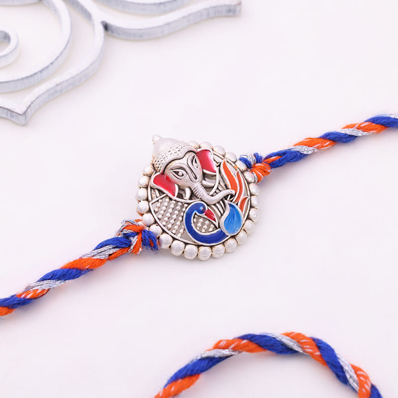 Ganesha Dial Rakhi With Pineapple Cake