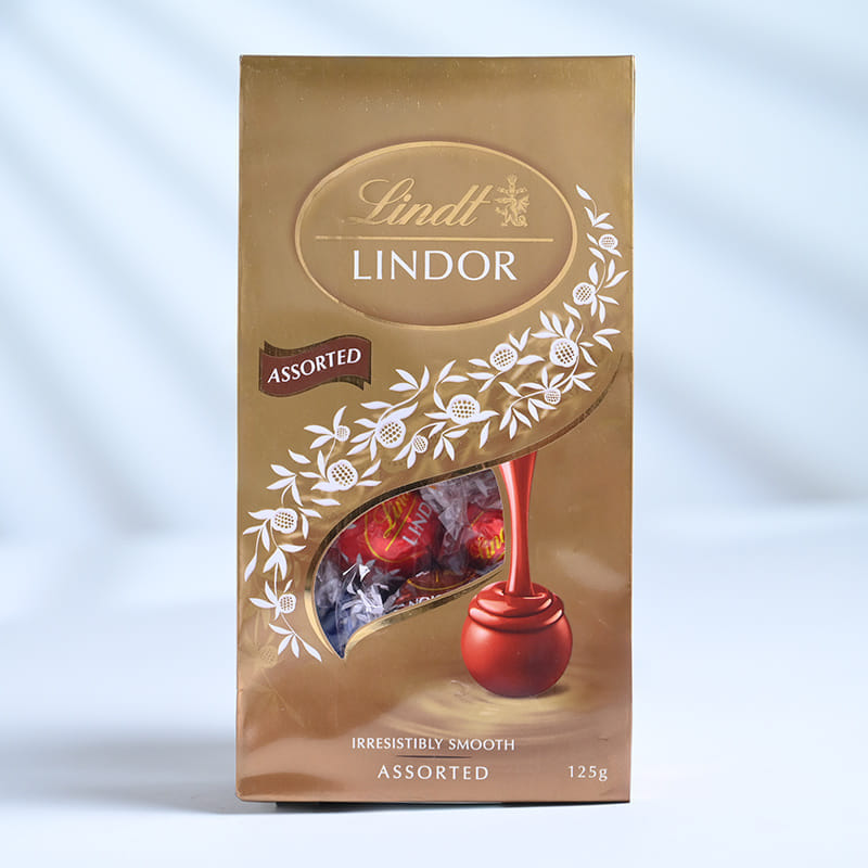 Sacred Silver Rakhi Trio With Lindt Lindor