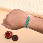 Third Product of Same Style White And Green Rakhi