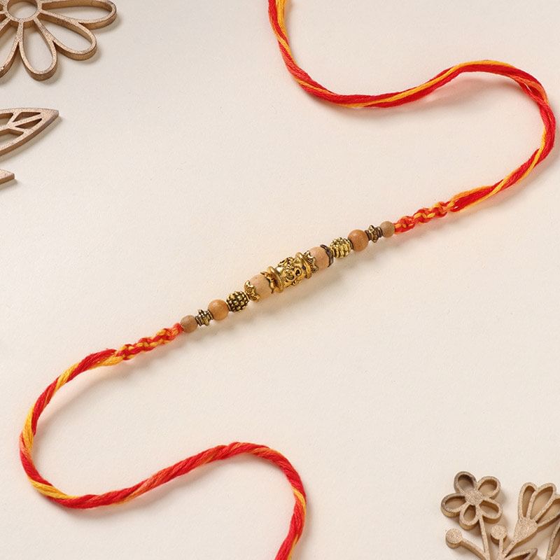 Serene Om Beaded Mauli Rakhi