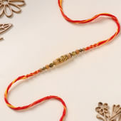 Serene Om Beaded Mauli Rakhi