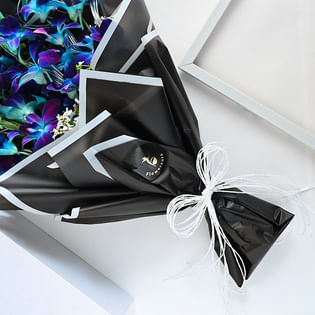 order Serene Orchids Bouquet for Valentines Day