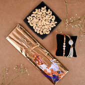 Serene White Beads Rakhi Combo: Bhaiya Bhabhi Designer Rakhi with Chocolates to germany