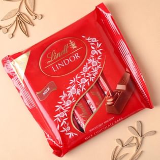 Five Designer Rakhis With Lindt Milk Chocolate Online