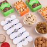 Set Of Five Metallic Motif Rakhis With Dry Fruits