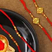 Set Of 4 Om N Rudraksha Rakhis with Complimentary Roli Chawal