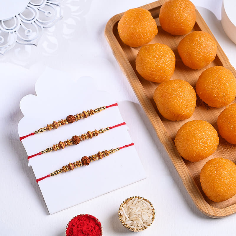 Set Of Three Rudraksha Rakhis N Motichoor Laddoo