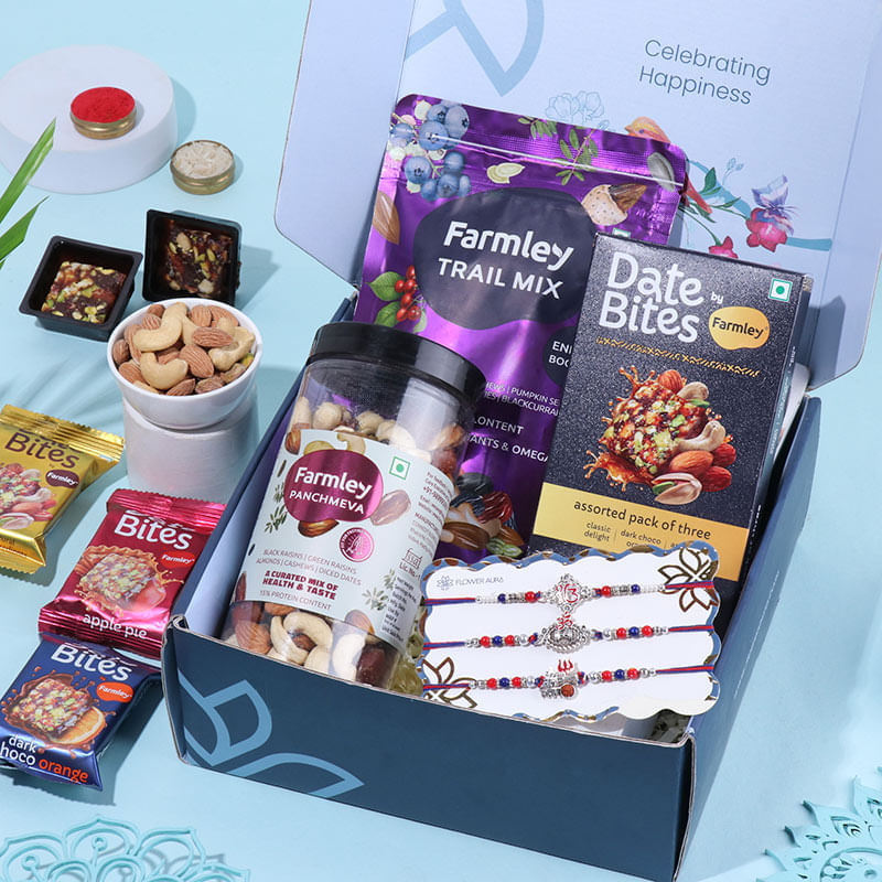 Set Of Three Spiritual Rakhis N Munchies Hamper