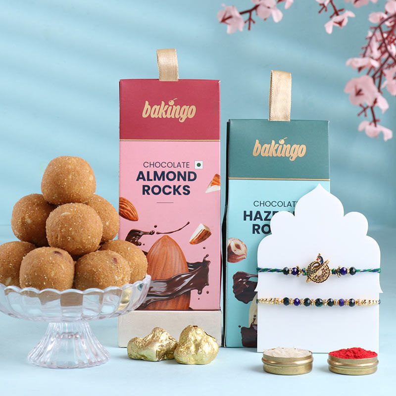 Set Of Two Designer Peacock Rakhis With Treats