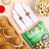 Set Of Two Designer Rakhi With Sweets N Nuts