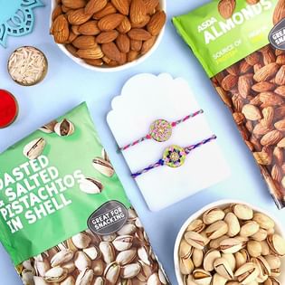 Set Of Two Elegant Beaded Rakhis With Dry Fruits