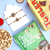 Set Of Two Elegant Rakhis With Sweets N Nuts