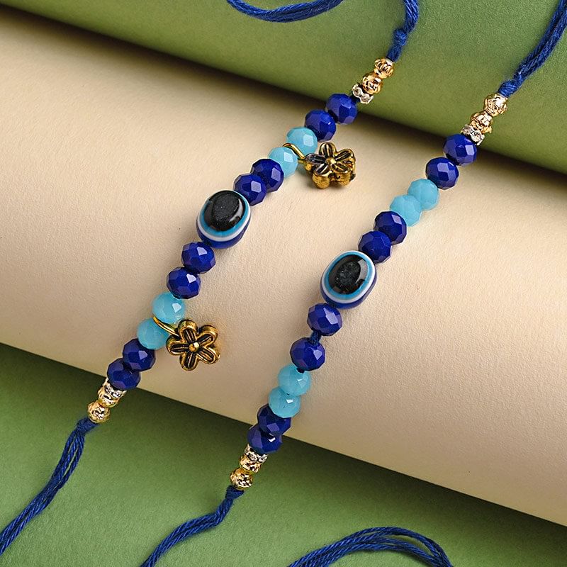 Buy Good Luck Rakhis for Bhaiya Bhabhi Online - Set Of Two Evil Eye Rakhis