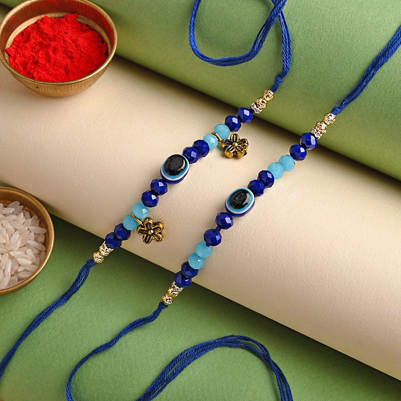 Send Set Of Two Evil Eye Rakhis for Bhaiya Bhabhi Online - Good Luck Rakhis