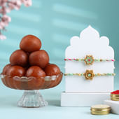 Set Of Two Floral Dial Rakhis With Sweets-UAE